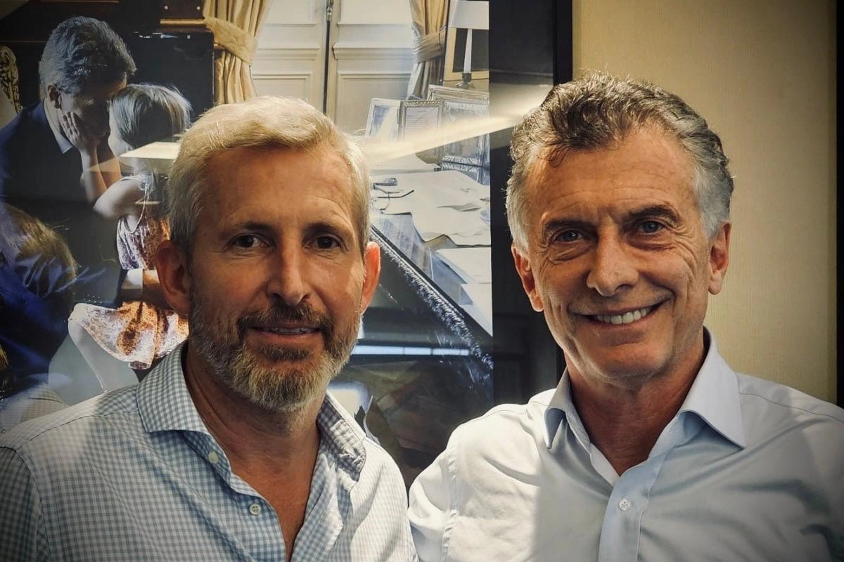 El gobernador Rogelio Frigerio junto al ex presidente Mauricio Macri.